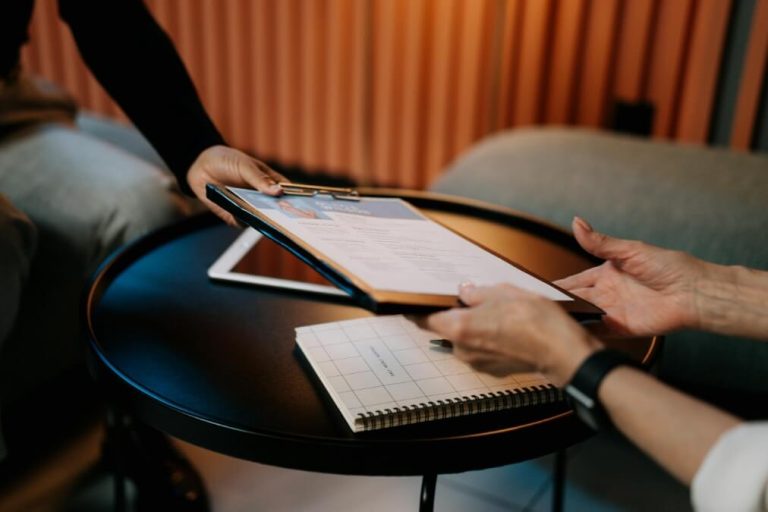 an employer exchanging documents with a client